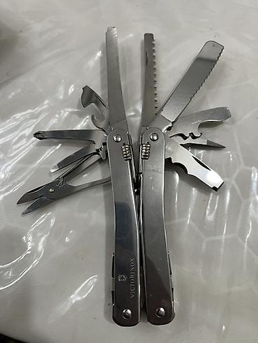 Инструменттер: Мультитул Victorinox (серия SwissTool/Spirit) с кожаным чехлом и — 4