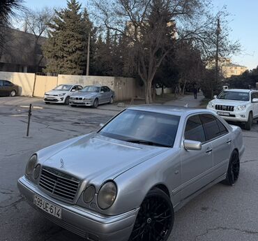 Mercedes-Benz: Mercedes-Benz E‑Class (W210) sedan Xüsusiyyətlər: - Korpus: 4 qapılı — 5