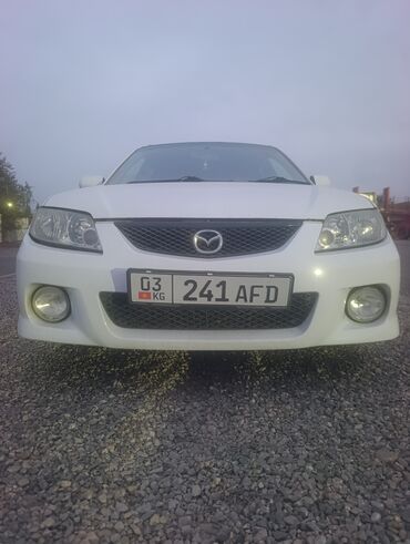 машина на запчасти: Mazda Familia: 2001 г., 1.5 л, Автомат, Бензин
