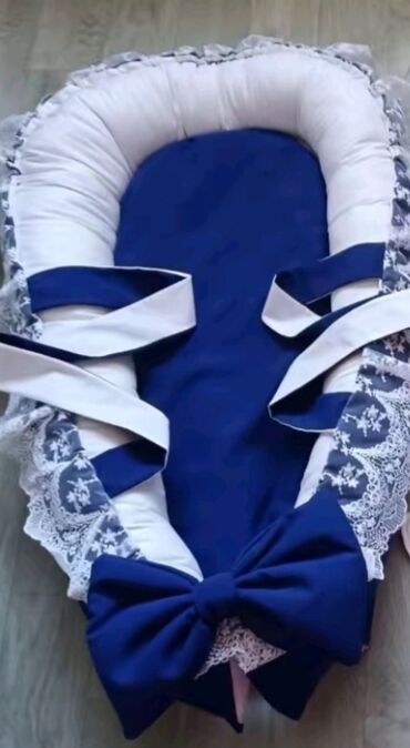 uşaq yellencekleri: Körpə üçün daşına bilən əl işi yatacaq içliyi ilə birlikdə verilir