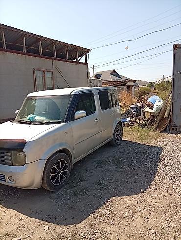 авто в такси: Nissan Cube: 2003 г., 1.3 л, Автомат, Бензин, Минивэн — 6
