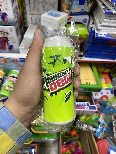 Игрушка-антистресс в виде банки Mountain Dew. Мягкий сжимаемый сквиш