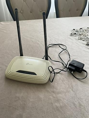 220 voltu 12 volta cevirme: TP-Link Wi‑Fi router - Model: TP-Link (əyri kənarlı krem rəngli — 1