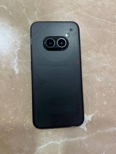 Digər mobil telefonlar: Nothing Phone 2A satılır. 12 ram 256 yaddaş. Kredit deyil. 2024 cu — 2