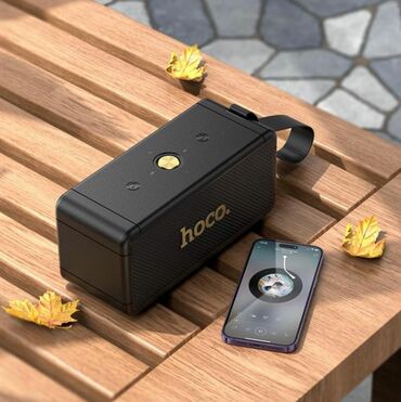 домашний караоке: Портативная Bluetooth-колонка Hoco. в черном корпусе с золотистым
