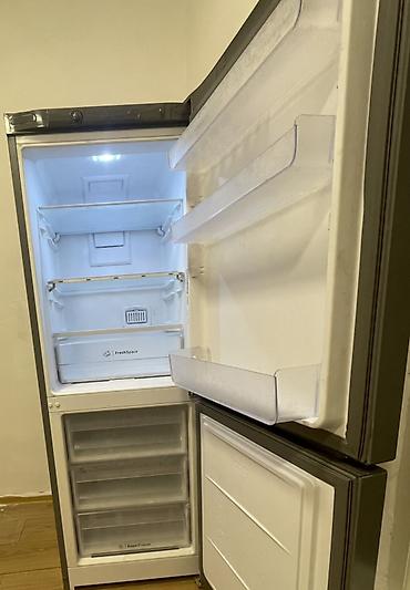 nomre satilir: Alt qapılı, iki kameralı soyuducu (inox/boz rəng). - Üst bölmə: geniş — 2