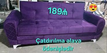 ağ divan: Bənövşəyi rəngdə, yumşaq məxməri parça ilə örtülmüş rahat divan. Geniş — 1