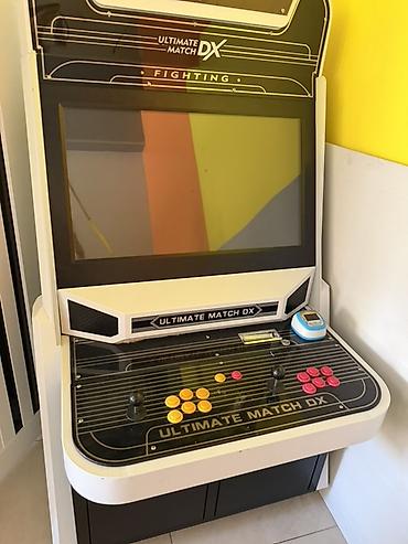 oyun rullari: Ultimate Match DX arkada oyunu kabineti - Korpus: hündür “sit‑down” — 1