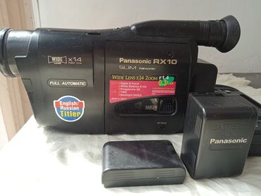 скрытая видео камера: Видеокамера Panasonic RX10 MiniDV в черном корпусе, оснащенная