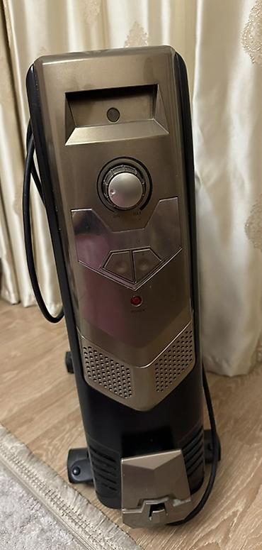 delonghi radia s: Yağlı radiator tipli elektrikli qızdırıcı - Rəng: qara, metalik ön — 3