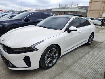 авто в рассрочку электромобиль: Сдается в аренду Kia K5 белого цвета с черной крышей. Автомобиль имеет