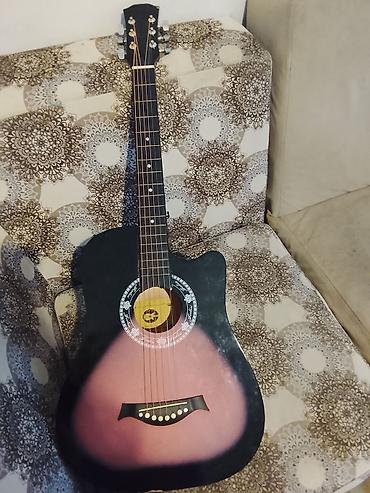 gibson gitara: Akkustik gitara – kəsikli (cutaway) korpuslu, 6 simli model — 1