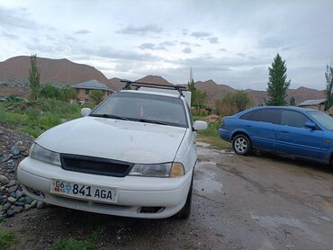 кир машине: Daewoo Nexia: 1995 г., 1.5 л, Механика, Газ, Седан