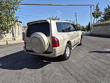 mitsubishi pajero 2000: Mitsubishi Pajero SUV - Korpus: qızılı/bej rəng, 5 qapı, yan — 3