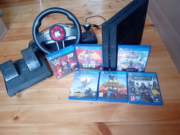 PS4 (Sony Playstation 4): PlayStation 4 fat oyun konsolu 1tb, idarəetmə paneli və bir neçə oyun