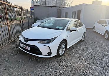 волга газ: Toyota Corolla: 2023 г., 1.8 л, Вариатор, Гибрид, Седан — 2