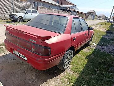 Mazda: Mazda Familia: 1992 г., 1.6 л, Кол менен иштөөчү, Бензин, Седан — 4