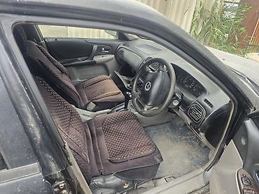 мазда фамили: Mazda Familia: 2003 г., Автомат, Седан — 5