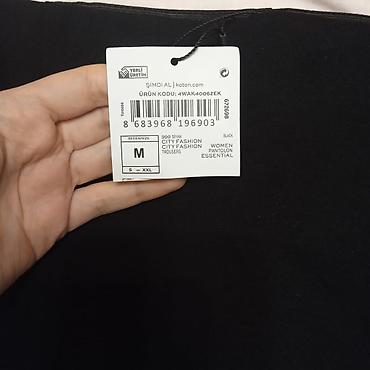 Ətəklər: Koton markası Yenidir, etiketi üzərində Ölçüsü : M Ölçüsü səhv — 2