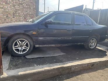 эшик машина: Nissan Primera: 1993 г., 1.6 л, Кол менен иштөөчү, Бензин, Седан — 4