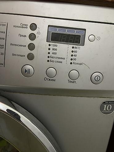 Elektronika: LG paltaryuyan maşın, ön yükləməli model. Üzərində “DirectDrive 5 kg” — 3