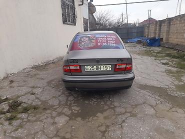 Daewoo: Daewoo Nexia sedan - Kuzov: 4 qapılı sedan, boz rəng - Mühərrik və — 4