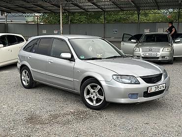 пороги демио: Mazda 323: 2001 г., 1.6 л, Механика, Бензин, Хэтчбэк — 3