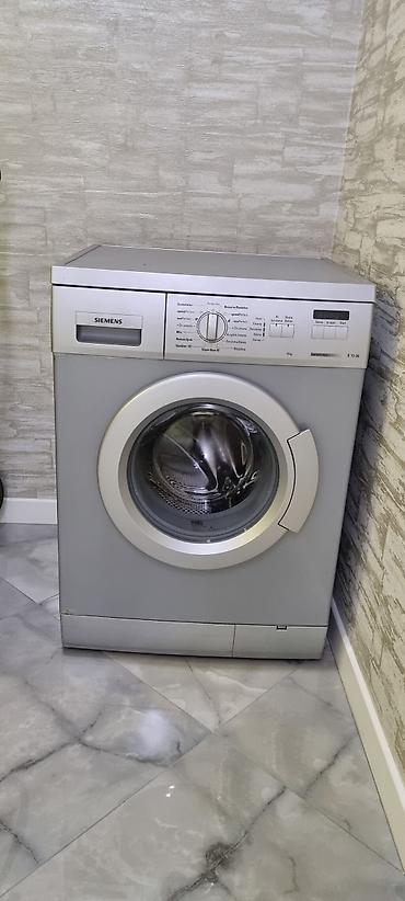 Məişət texnikası: Siemens paltaryuyan maşın – ön tərəfdən yüklənən, boz korpuslu model — 1