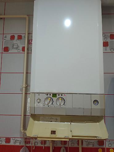 prekidac za motor: Gasni kotao kombinovani fasadni Bosch-Junkers  snage 28kW potpuno — 4