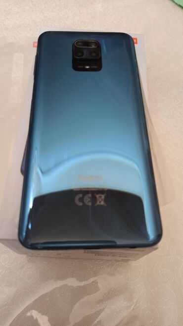 старые телефоны fly в Азербайджан | FLY: Xiaomi Mi 9 SE | 128 ГБ цвет - Синий | Гарантия, Сенсорный, Отпечаток пальца