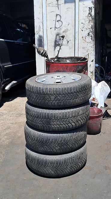 opel kolpak: 4 ədəd avtomobil təkəri və 1 ədəd Opel loqolu təkər qalpağı (kolpak) — 1