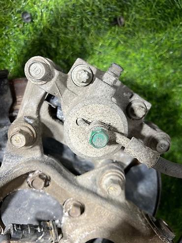 oem: Суппорт тормозной задний для Hyundai Tucson TL (поколение 3), год — 1