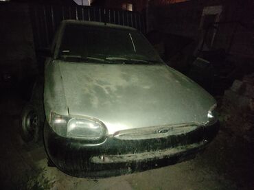 кузов сатылат: Ford Escort хэтчбек 4 дверная (поколение 1998‑е), серебристый цвет