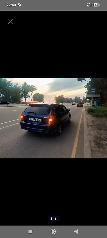 щуп демио: Mazda Familia: 2002 г., Хэтчбэк — 5