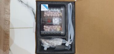 Akvarium aksessuar və ləvazimatları: Ağ rəngli silindrik korpusa malik akvarium xarici filtri. Qablaşdırma — 7