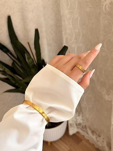 buji: Cartier– qolbaq və üzük - Minimalist dizayn: hamar səth, dairəvi — 1