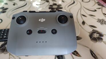 автозапуск для авто: Пульт дистанционного управления DJI в сером корпусе, предназначенный