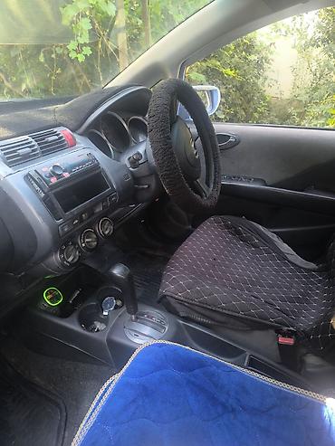rota grid: Honda Fit: 2002 г., 1.3 л, Автомат, Бензин, Хэтчбэк — 7