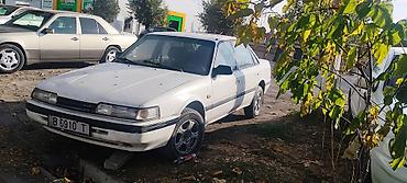 Транспорт: Mazda 626: 1990 г., 2 л, Механика, Бензин, Седан — 4