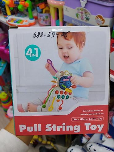 hello kitty: Игрушка для развития мелкой моторики “Pull String Toy” — 4-в-1. - — 1