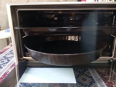 Plitələr və bişirmə panelləri: İtimat Best Cooker elektrik sobası - Güc: 1615 W (etiketdə — 5