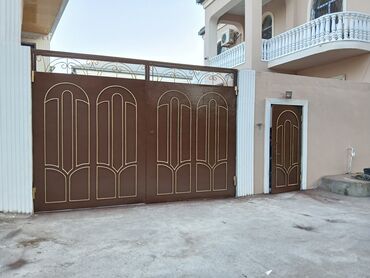 Darvazaların rənglənməsi: Darvaza rəngləmə və təmir xidməti təklif olunur. Bu xidmət köhnəlmiş — 9