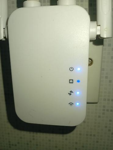 Modemlər və şəbəkə avadanlıqları: Wi‑Fi siqnal gücləndirici / range extender - Divar prizinə qoşulan — 2
