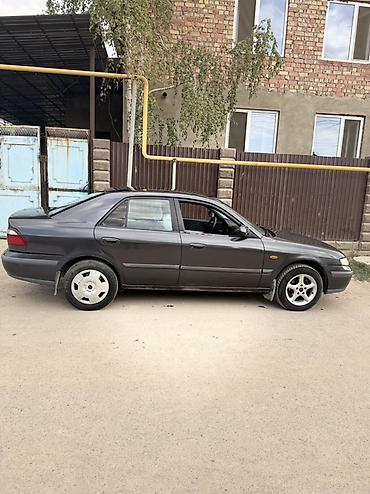e6 3: Mazda 626: 1999 г., 2 л, Механика, Бензин, Седан — 5