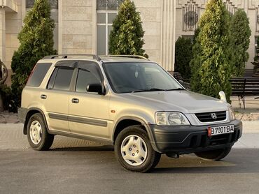 топор диски: Honda CR-V I поколения (рестайлинг), 5‑дверный кроссовер серебристого