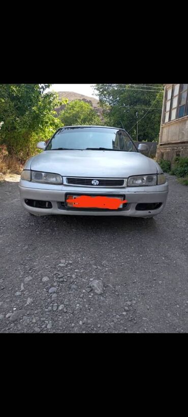 машина ала бука: Mazda Cronos: 1992 г., 2 л, Механика, Бензин, Седан