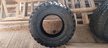 экскаватор пагрузчик: Шина внедорожная 235/75 R15 - Размер: 235/75 R15 - Конструкция