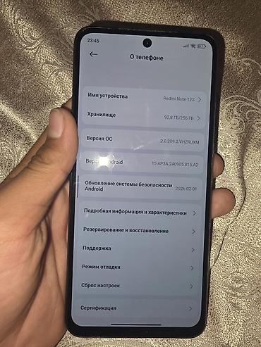 колонки и микрофон: Смартфон Redmi (черный цвет) Основные особенности: - Тыльный блок — 6