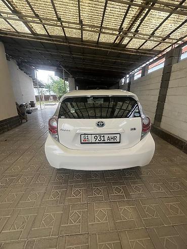 тойота аква гибрид: Toyota Aqua: 2013 г., 1.5 л, Автомат, Гибрид — 4