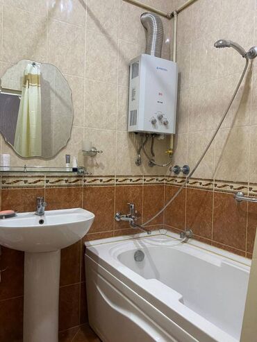 Uzunmüddətli kirayə mənzillər: Nərimanov metrosuna yaxın 5 mertebeli binanın 5-ci mərtəbəsində — 2